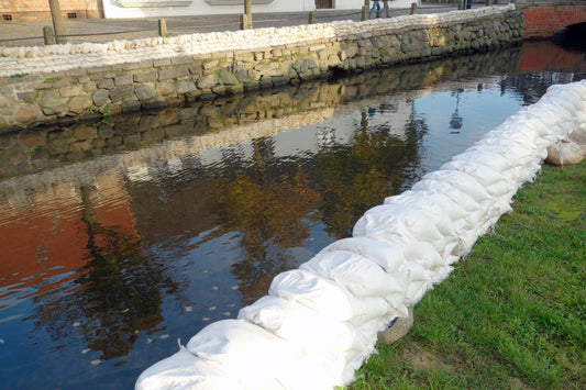 An image of a riverbank protected with sandbags